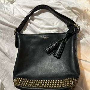 Studded Coach bucket purse-gently used